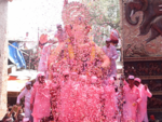 Colourful farewell for Lalbaugcha Raja with flower shower.