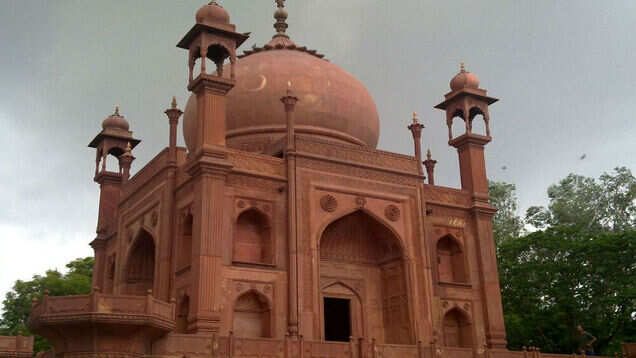 A Red Taj in memory of a beloved husband