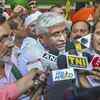 Farmer leaders under the banner of Bharatiya Kisan Union's address the media after their meeting with Rajnath Singh at his residence. (Photo: PTI)