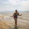Doing 'Baywatch' slo-mo on a beach
