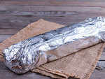 Wrap bread in plastic or aluminum foil