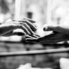 Holding the hands loosely only when touched accidentally