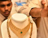 Gold loses sheen, down Rs 80 on weak trend overseas