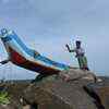 Fishermen moving their boats and other fishing wares to safety due to heavy wind. A scene at Parangipettai close to Ennore