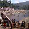 Pilgrims take a dip at Pamba