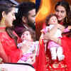 Sara holding the famous Taimur doll
