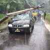 An electric pole falls on a car at Uppalaguptam coastal area in East Godavari district