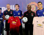 Manchester United players Wes Brown and Dwight Yorke attend a promotional event