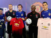 Manchester United players Wes Brown and Dwight Yorke attend a promotional event