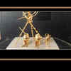 Article image for: Vellore <i class="tbold">goldsmith</i> creates Pongal pot, cane, bull using just 1.9 gm gold