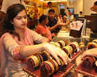 Gold prices rise by Rs 100 at Rs 33,750/10 gm on firm trend overseas