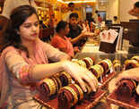 Gold prices rise by Rs 100 at Rs 33,750/10 gm on firm trend overseas