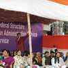 Mamata Banerjee asks singers on the stage to perform some songs to keep the crowd entertained