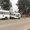 Ambulance and escort vehicles outside the border
