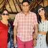 Hina poses with her mom and dad