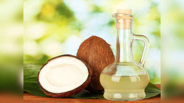 Oil pulling with coconut oil
