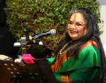 Usha Uthup performs at an event