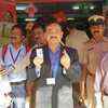Chief electoral officer for Karnataka Sanjiv Kumar exercised his franchise at a polling booth.
