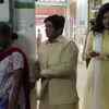 Lieutenant Governor Kiran Bedi stands in queue to cast her vote