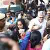 Actor Ajith along with his wife Shalini leaving the polling booth after casting their votes.