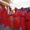 Saints of various mutts stand in queue to cast their votes in Chitradurga constituency