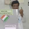 Maharashtra Congress chief and sitting MP from Nanded Ashok Chavan casts his vote at a polling station in Nanded parliamentary constituency.