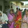 Voters outside polling booth number 151 in Supaul parliamentary constituency where voting is yet to begin, currently mock poll is underway at the polling booth after a faulty EVM was replaced (ANI)