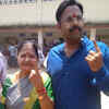 Anand Asnotikar JDS candidate from Uttara Kannada cast his vote at  Karwar. His mother former MLC Shubhalata Asnotikar can also be seen