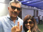 Filmmaker Prakash Jha accompanies daughter to the polling booth