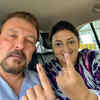 Union minister Smriti Irani and husband after casting vote
