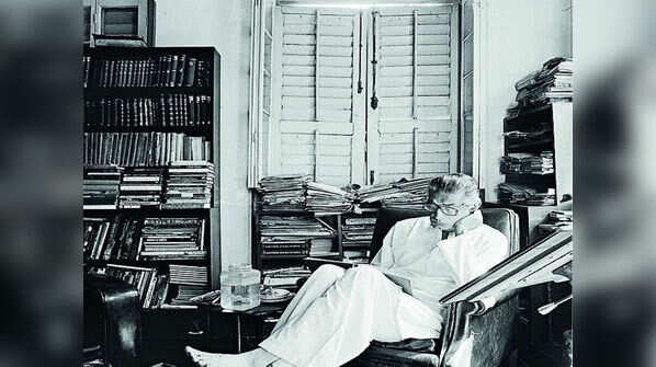 Immersed in work at his study