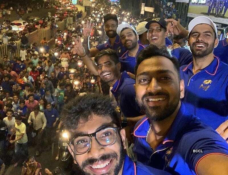 Mumbai Indians celebrate victory with fans in open-bus parade