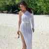 Pretty in thigh-high slit dress