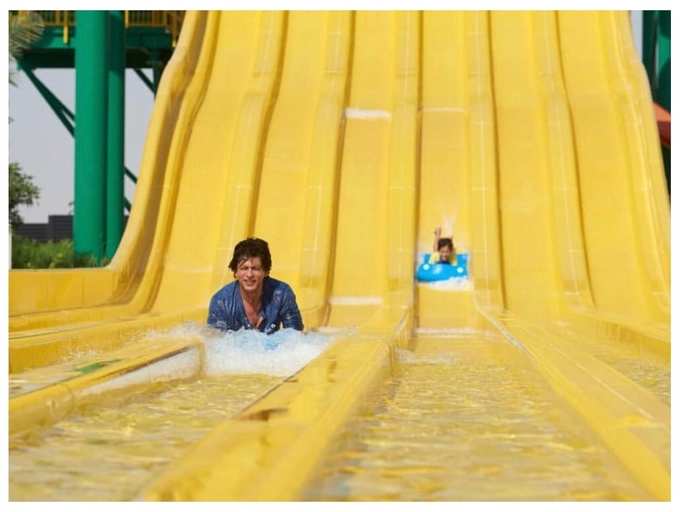 This picture of Shah Rukh Khan enjoying on a water slide will awaken you inner child