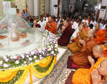Devotees celebrate Buddha Purnima at Tank Bund