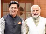 Standing proudly next to PM