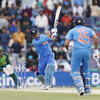 Dhoni, Rahul make handy contributions