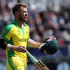 David Warner walks back after scoring 3 runs. (AP Photo)