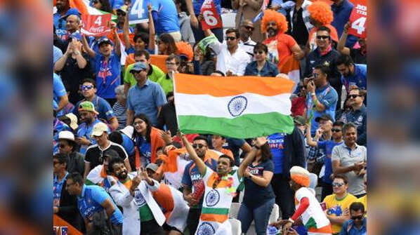 Indian supporter waves a flag