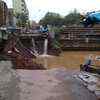 Suburban Powai lake overflows after heavy overnight rain.