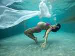 Sameera Reddy flaunts her baby bump in an underwater photoshoot