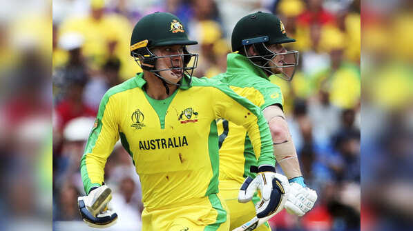 Smith and Carey rebuild the innings for Australia