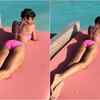 Article image for: Mandira Bedi flaunts her curvacious body in neon pink bikini!