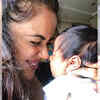 ​Sameera Reddy cuddles up with her month-old daughter, Nyra