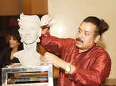 Socialites bond over art and some live sculpting at this group exhibition