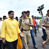 TDP leader and Chandrababu Naidu's son Nara Lokesh interacts with police officials. He was later put under house arrest