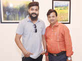 Art lovers attend a painting exhibition