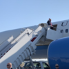 US President Donald Trump emplanes for Houston to attend 'Howdy, Modi' event.