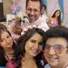 Priya and her husband with their friends