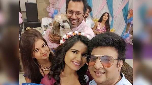Priya and her husband with their friends